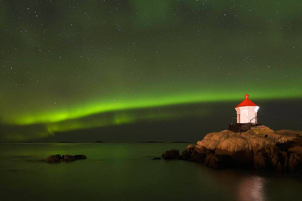 Northern Lights via lighthouse (Aurora borealis), Eggum, Vestvagoy, Lofoten, Norway, Europe