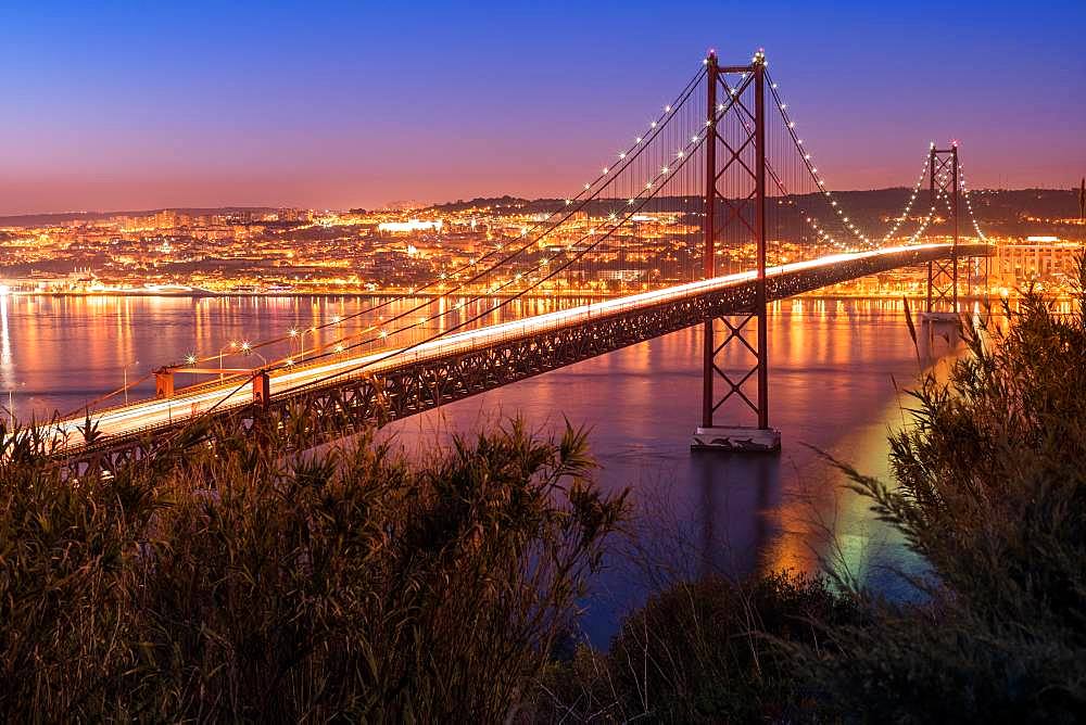 Bridge, Ponte 25 de Abril, at dusk, Lisbon, Portugal, Europe