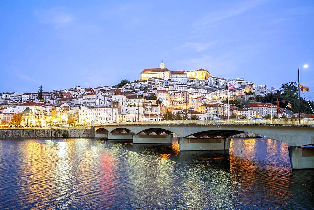 Cityscape with university at top of the hill in the evening, Coimbra, Portugal, Europe