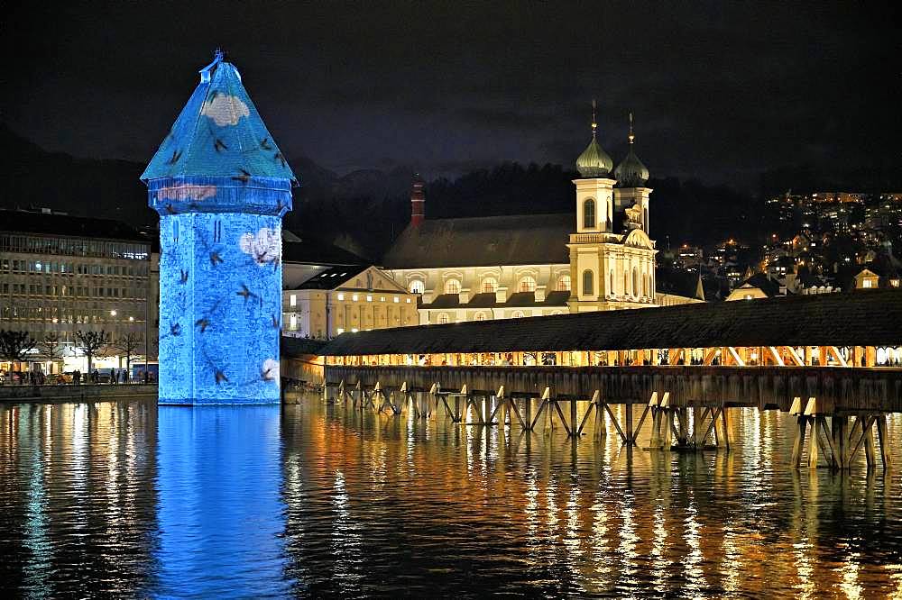 Wassertum with light installation, right Chapel Bridge, behind Jesuit Church on the Reuss at dusk, Old Town, Lilu, Light Festival 2020, Lucerne, Canton Lucerne, Switzerland, Europe