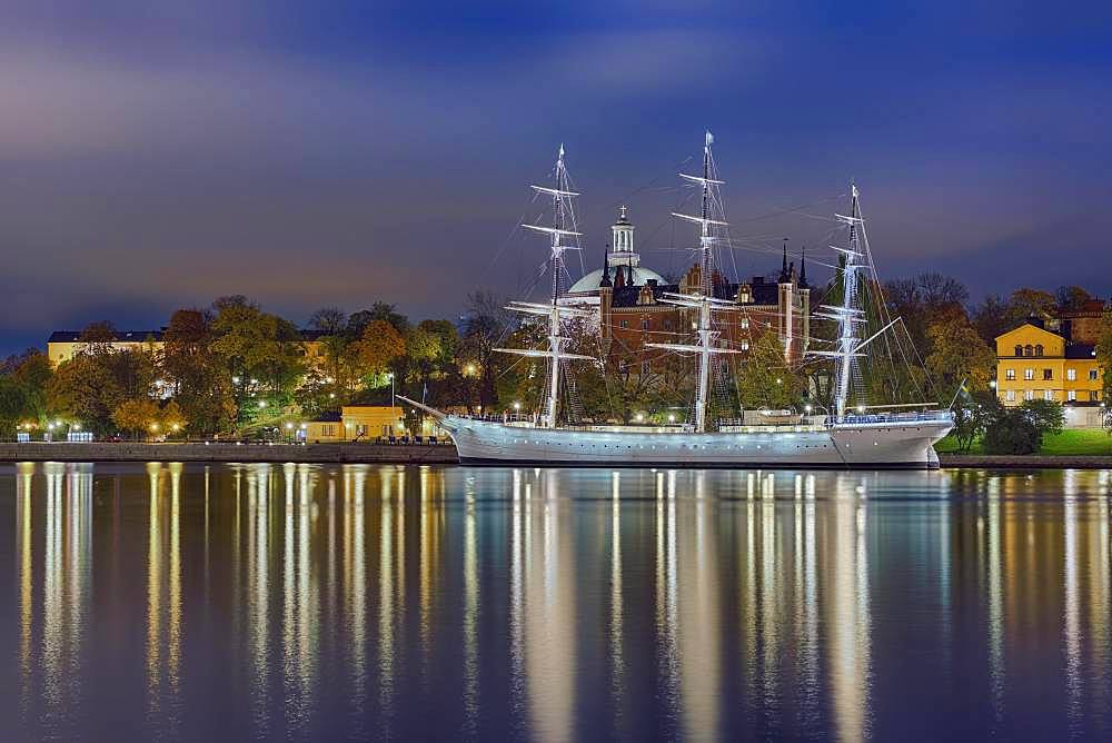 Harbour Chapman off Skeppsholmen, red admiralty house, illuminated, Stockholm, Sweden, Europe