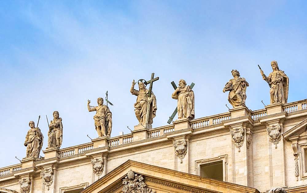 Statues of Jesus Christ, John the Baptist and Apostles on the facade of St Peter's Basilica, Piazza San Pietro, Vatican, Rome, Italy, Europe