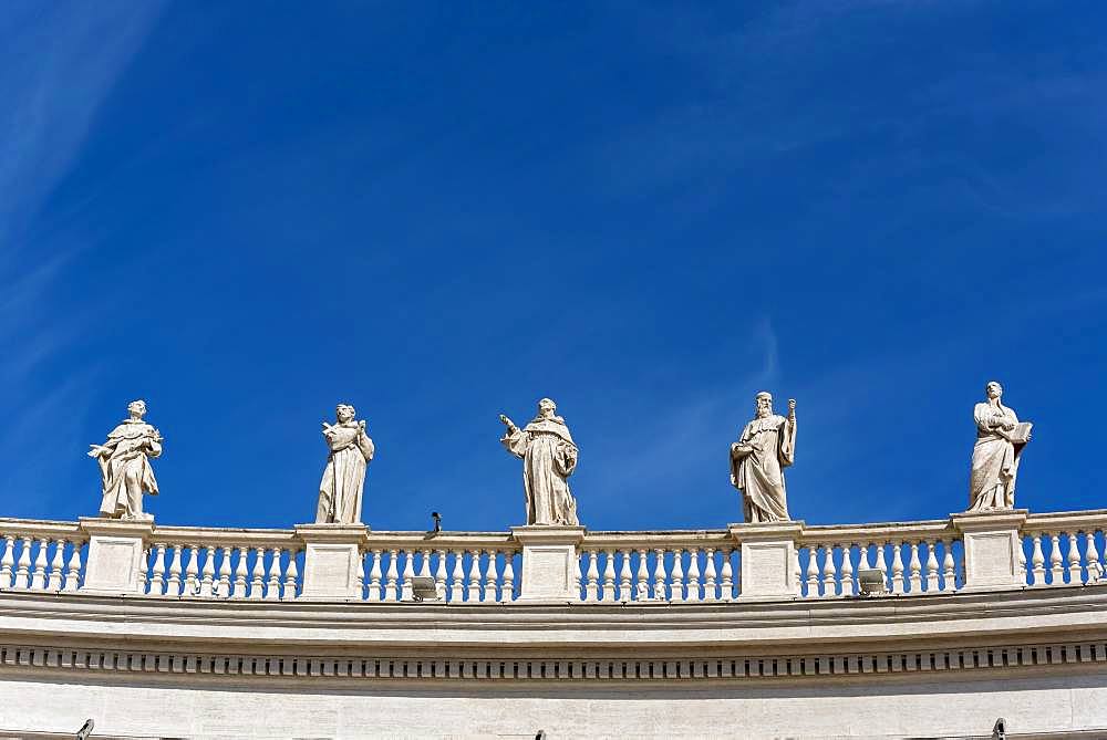 Statues of St. Dominic, Francis of Assisi, St. Bernard, St. Benedict and St. Ignatius Loyola, St. Peter's Square, Vatican, Rome, Italy, Europe