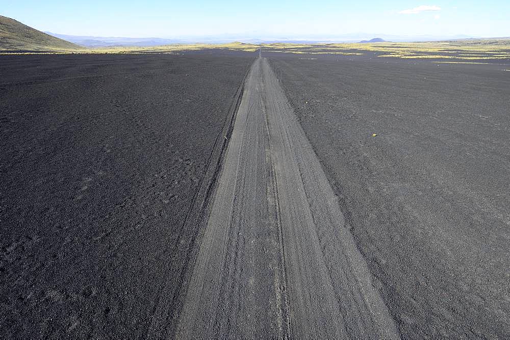 Track through volcanic lunar landscape, Reserva La Payunia, Province of Mendoza, Argentina, South America