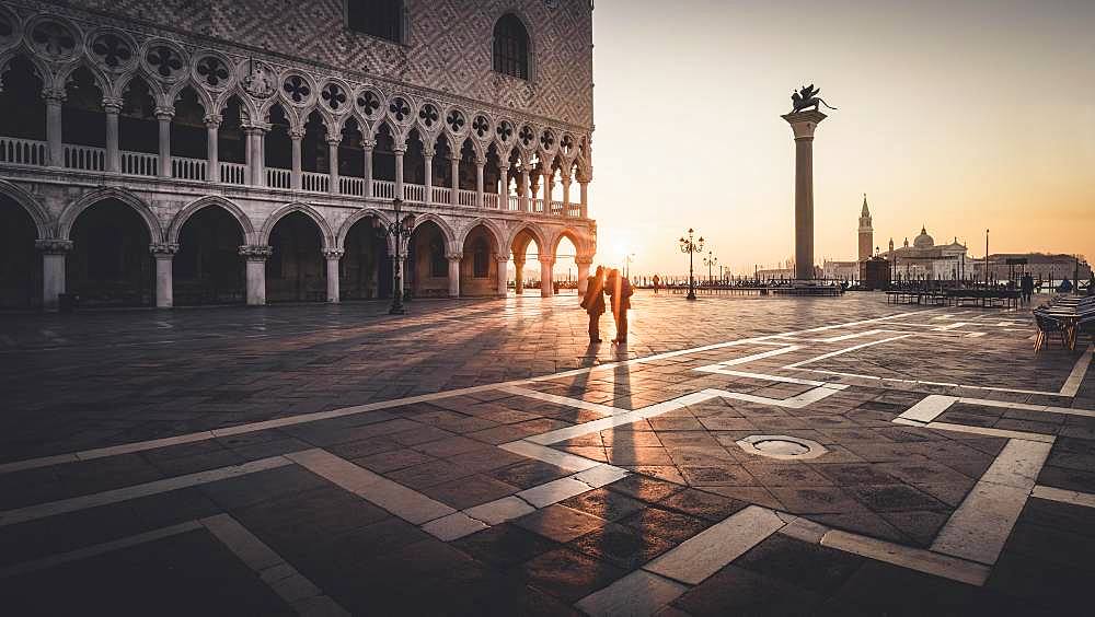 Sunrise with lovers at St Mark's Square, Venice, Italy, Europe