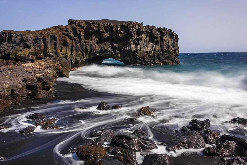 Surf and waves, water flows after a big wave between stones back to the Atlantic Ocean, south coast, La Palma, Canary Islands, Canary Islands, Spain, Europe