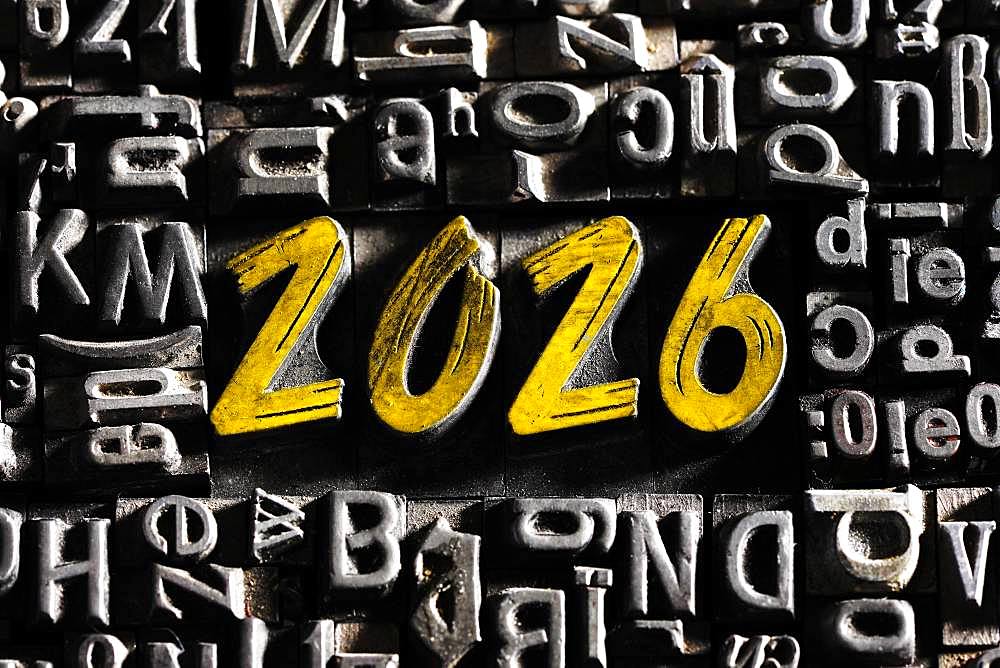 Old lead letters with golden writing show the word 2026, Germany, Europe