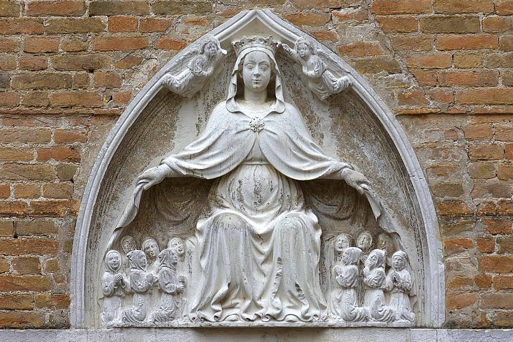 Relief of the Virgin Mary, representation of the Virgin Mary hiding the faithful under her spread cloak, Venice, Veneto, Italy, Europe