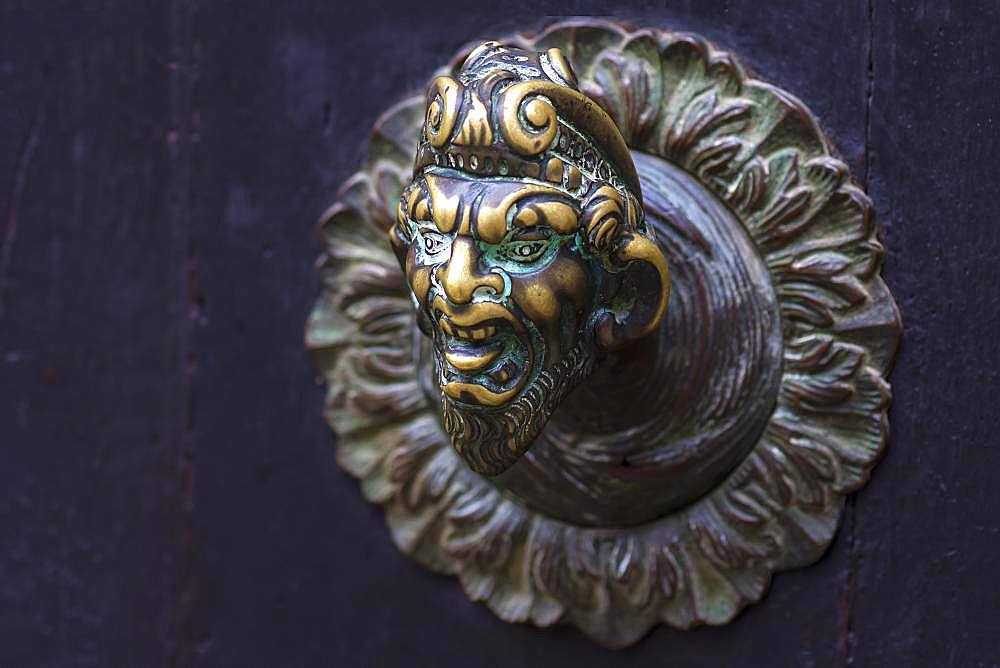 Male bronze figure as doorknob, Venice, Veneto, Italy, Europe