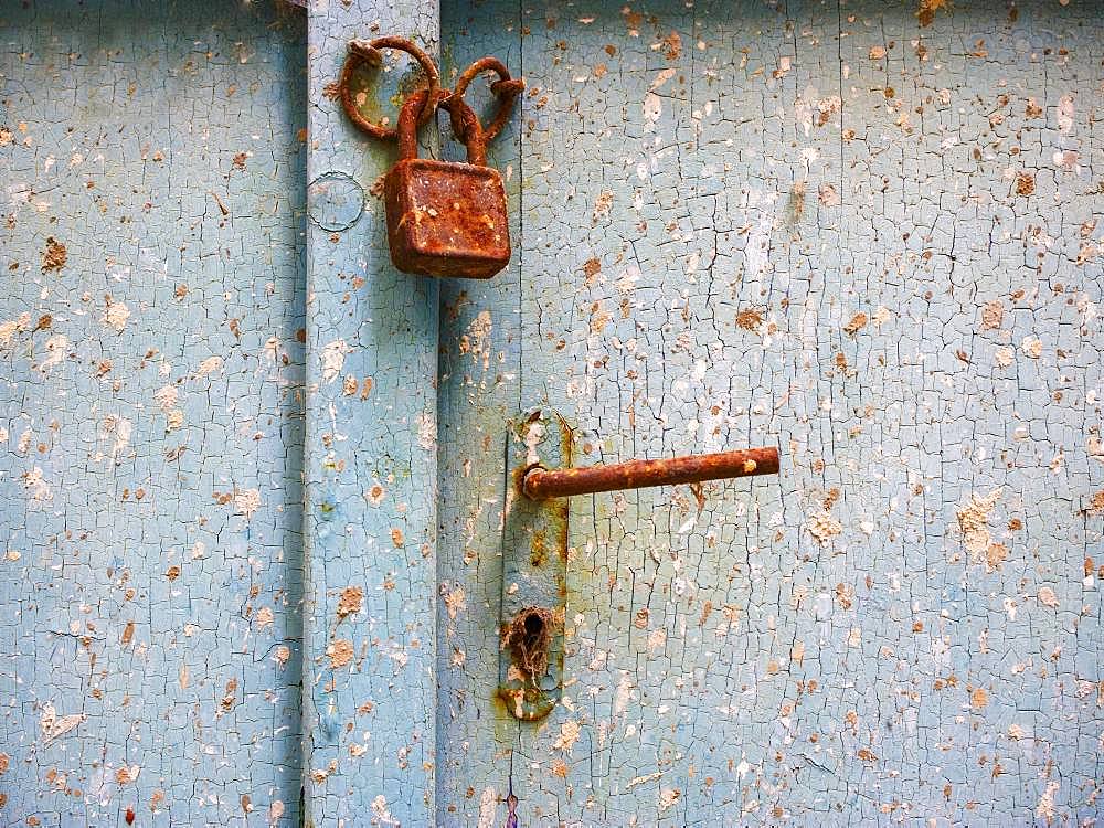 Old door lock with door handle on weathered wooden door, Baska, Island of Krk, Kvarner Gulf Bay, Croatia, Europe