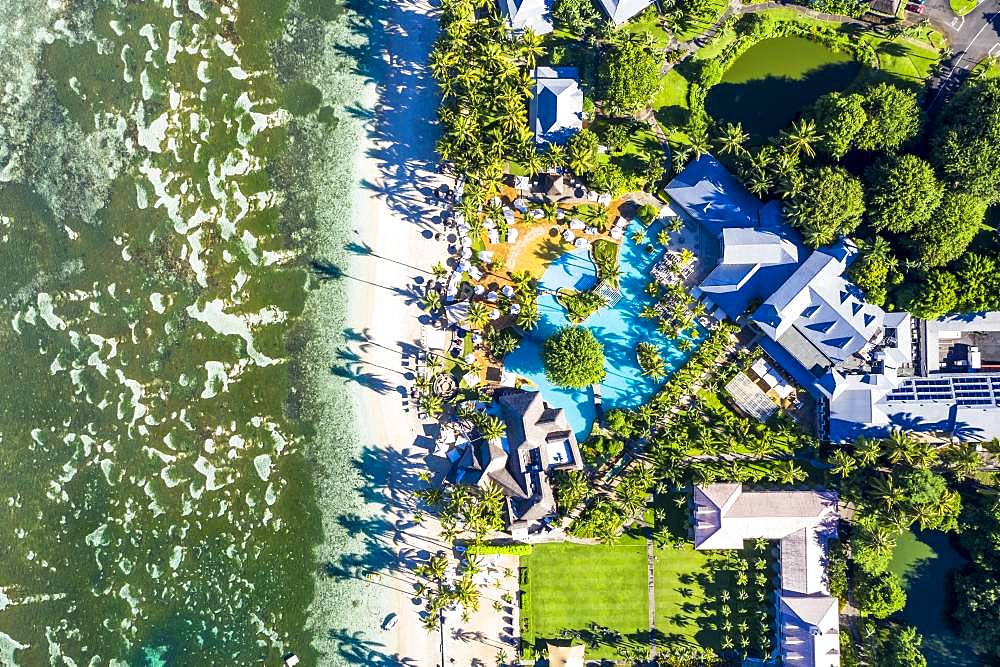 The beach of Flic en Flac with the luxury hotel Sugar Beach Golf & Spa Resort and palm trees, Mauritius, Africa