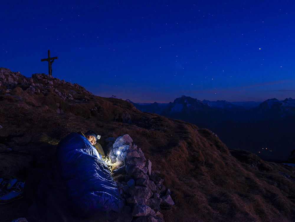 Mountaineer bivouacs at the summit of the Berchtesgadener Hochthron, Untersberg, Berchtesgadener Alps, Bischofswiesen, Berchtesgadener Land, Upper Bavaria, Bavaria, Germany, Europe