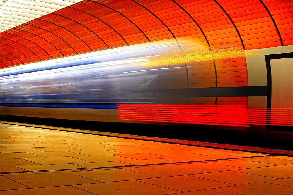 Light tracks of a moving subway, Munich, Germany, Europe