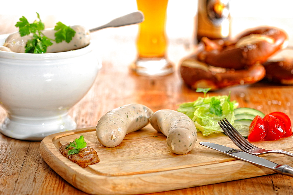 Munich Weisswurst breakfast with pretzels and wheat beer, Germany, Europe