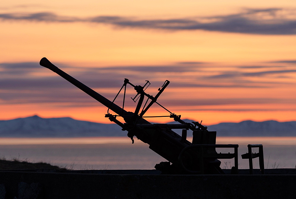 Flak position, gun at the sea from the 2nd world war in the evening sun, Senjehestneset, Senja island, Troms, Norway, Europe