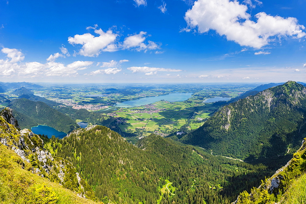 Panorama from Saeuling, 2047m, to the Tannheimer Berge, Vils, in the district Reutte in Tyrol, Austria, as well as Falkensteinkamm, Weissensee, Fuessen, Hopfensee, Forggensee and Bannwaldsee, Ostallgaeu, Bavaria, Germany, Europe