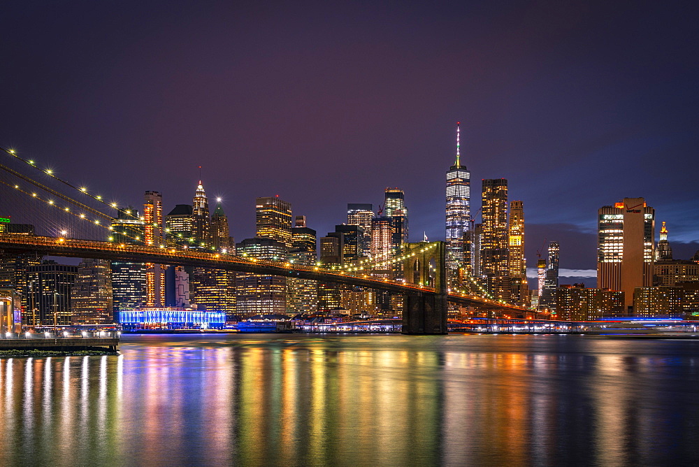 View from Main Street Park at night over the East River to the skyline of lower Manhattan, Brooklyn Bridge, Dumbo, Downtown Brooklyn, Brooklyn, New York, USA, North America