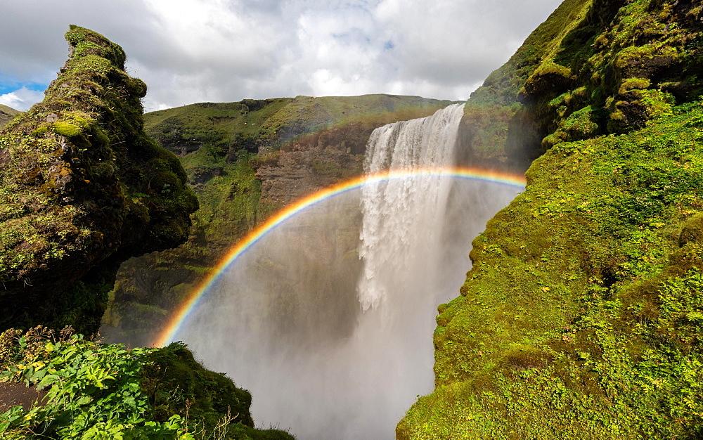 Rainbow in front of the big waterfall Skogafoss, Skogafoss, Skogar, Ring Road, Sudurland, Southern Iceland, Iceland, Europe