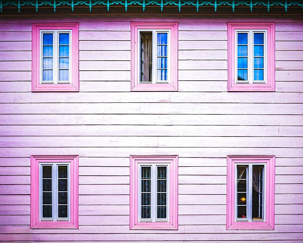 Pink wooden facade with windows, architectural detail, Poland, Europe