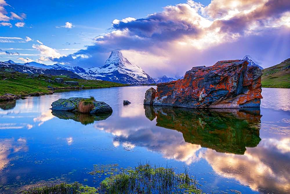 Matterhorn reflected in the Stellisee at sunset, Zermatt, Valais, Switzerland, Europe