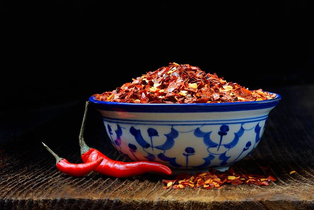 Chili flakes in shell and chilli peppers, Germany, Europe