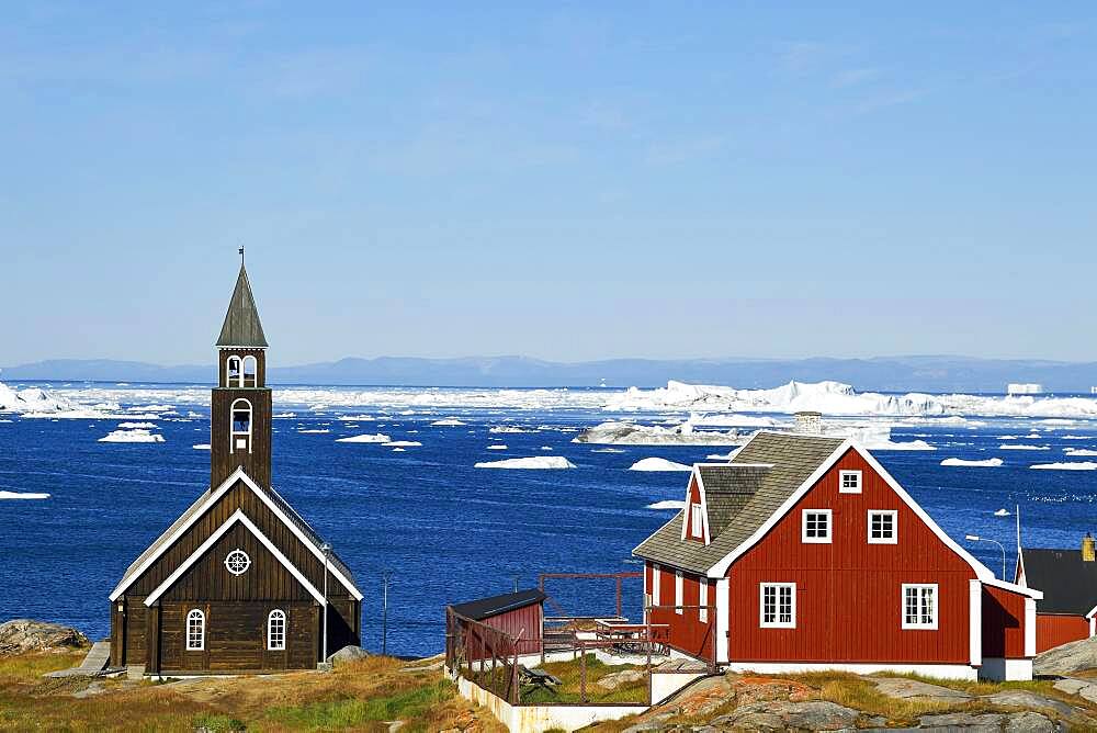 Zion Church and colourful wooden houses, Disko Bay, Ilulissat, West Greenland, Greenland, North America