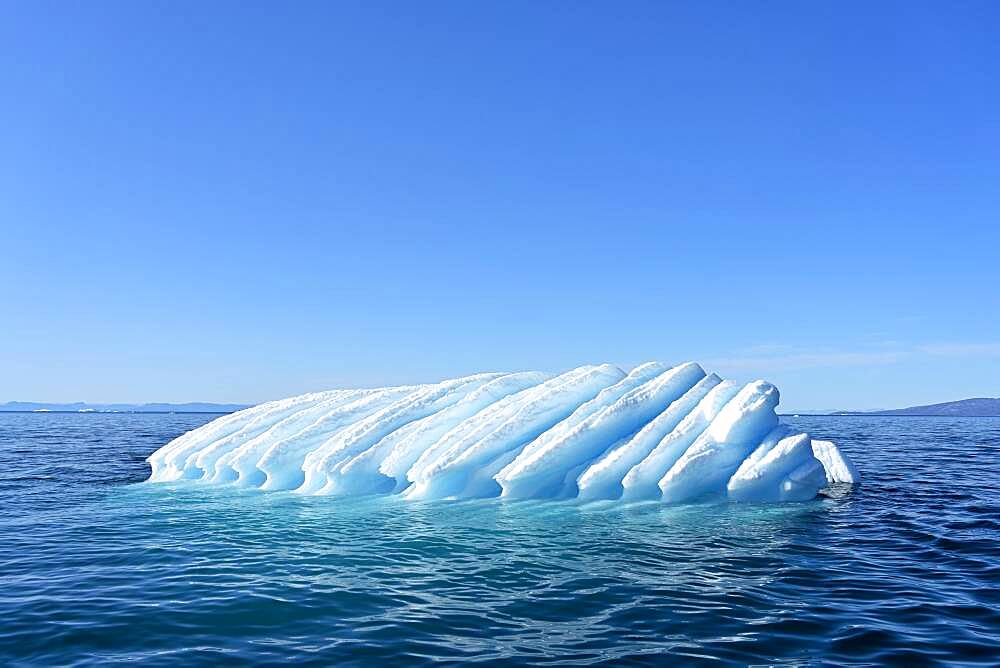 Iceberg drifts through Icefjord, UNESCO World Heritage Site, Disko Bay, Ilulissat, West Greenland, Greenland, North America