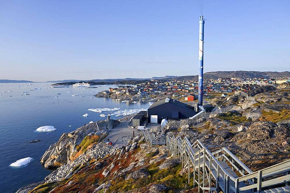 City view with waste incineration plant at Disko Bay, in the foreground drift ice in the sea, lulissat, West Greenland, Greenland, North America