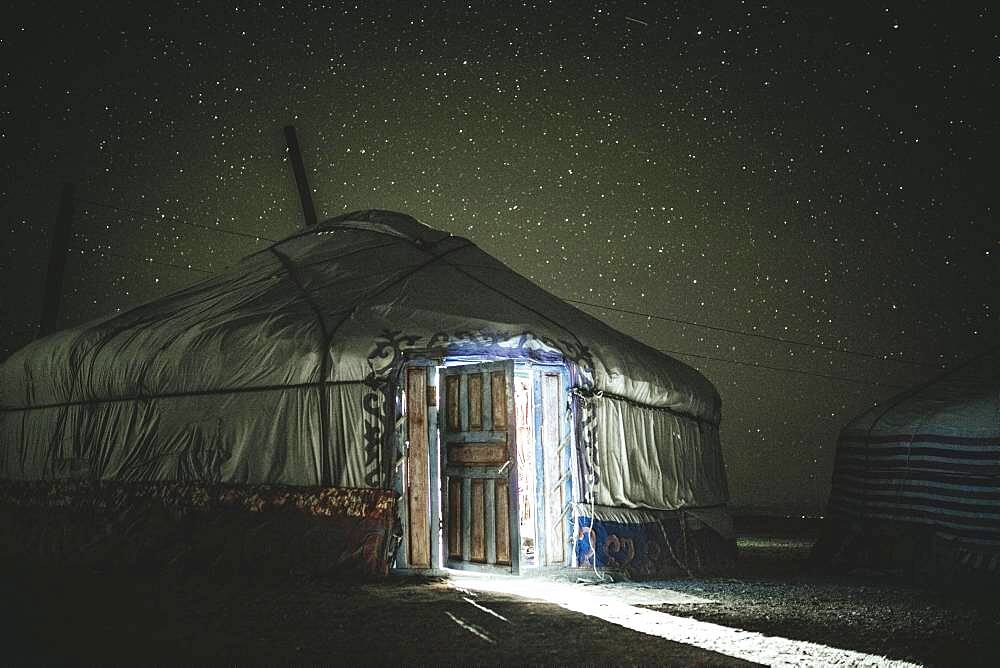 Yurt of eagle hunter Bashakhan Spai at night, starry sky over Kisil Char, Olgii, Mongolia, Asia