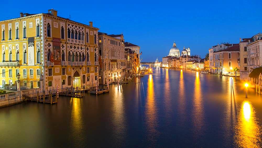 Canal Grande at night, left Renaissance palace Palazzo Cavalli-Franchetti, back church Santa Maria della Salute, Venice, Italy, Europe