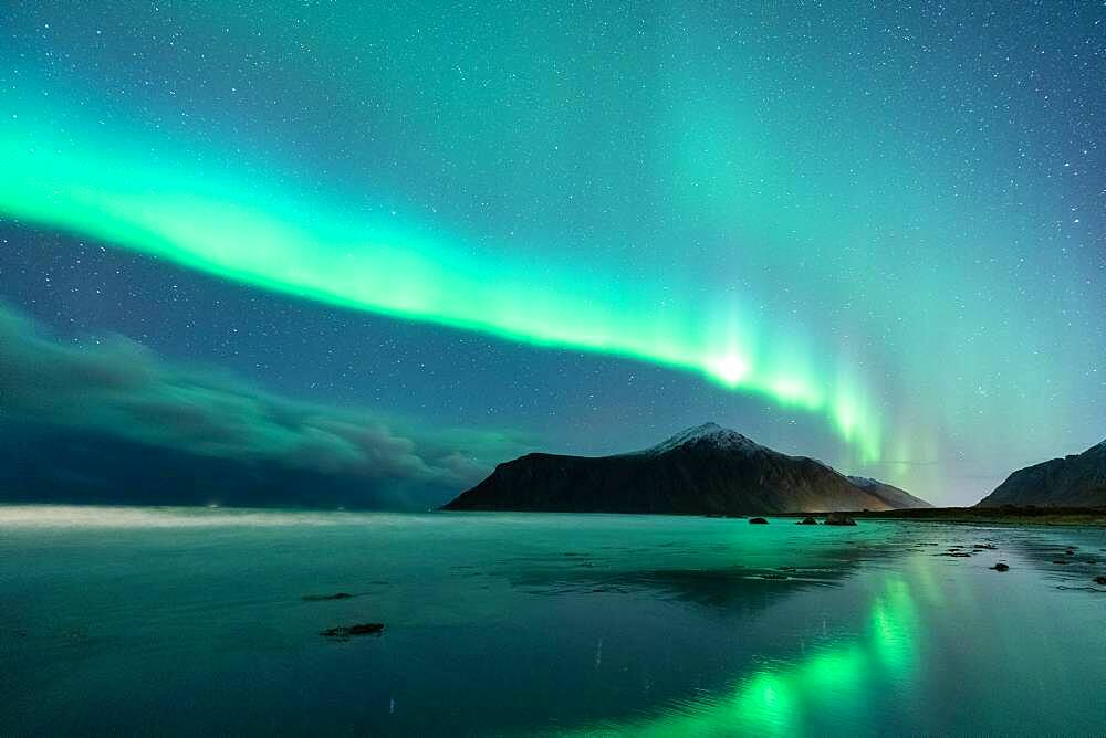 Flakstad beach with northern lights, Flakstad, Lofoten, Norway, Europe