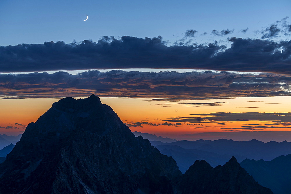 Blue hour over Allgaeu and Lechtal mountains in the foreground summit of the Widderstein, Baad, Kleinwalsertal, Vorarlberg, Austria, Europe