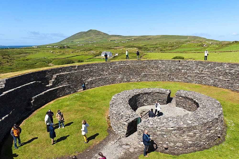 Archaeology, tourists, iron age ring fort Cahergall, Cahersiveen, Ring of Kerry, County Kerry, Ireland, Europe