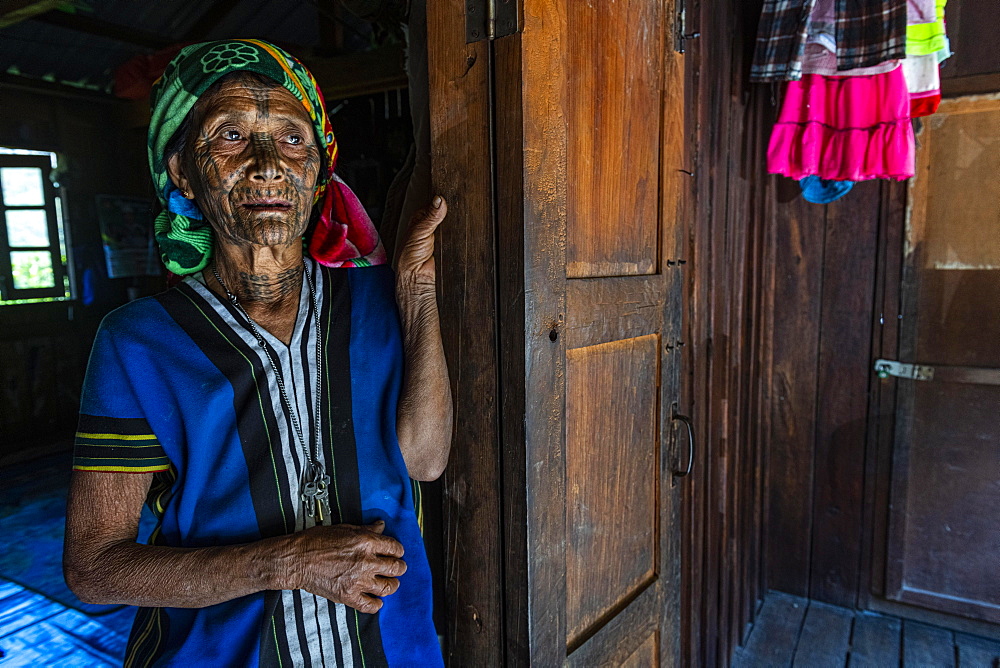 Chin woman with spiderweb tattoo, Mindat, Chin state, Myanmar, Asia