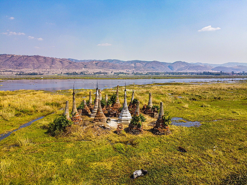 Aerial of little pagodas sitting in the waters of the southern Inle lake, Nyaungshwe, Shan state, Myanmar, Nyaungshwe Township, Shan State, Myanmar, Asia