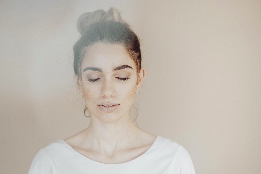 Young woman with closed eyes