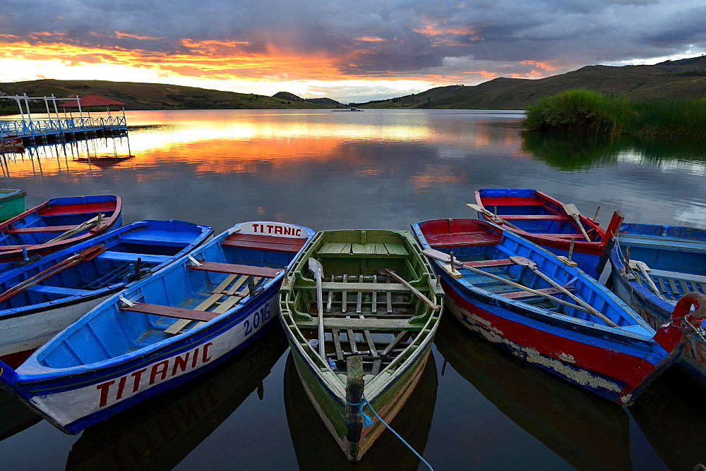 Rowboats on Laguna Sausacocha at sunset, Huamachuco, Sanchez Carrion Province, Peru, South America