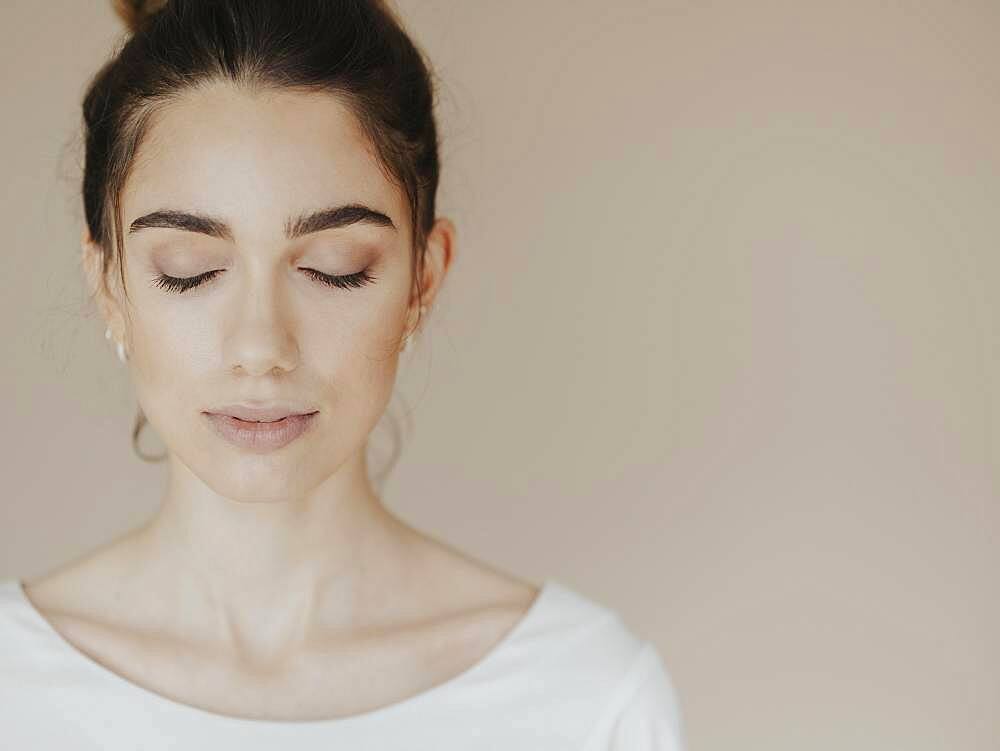 Young woman with closed eyes