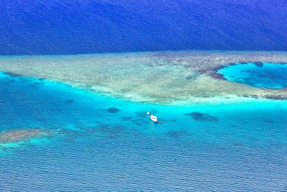 Vacation paradise ship boat sea text free space copyspace aerial photo tourism in maldives