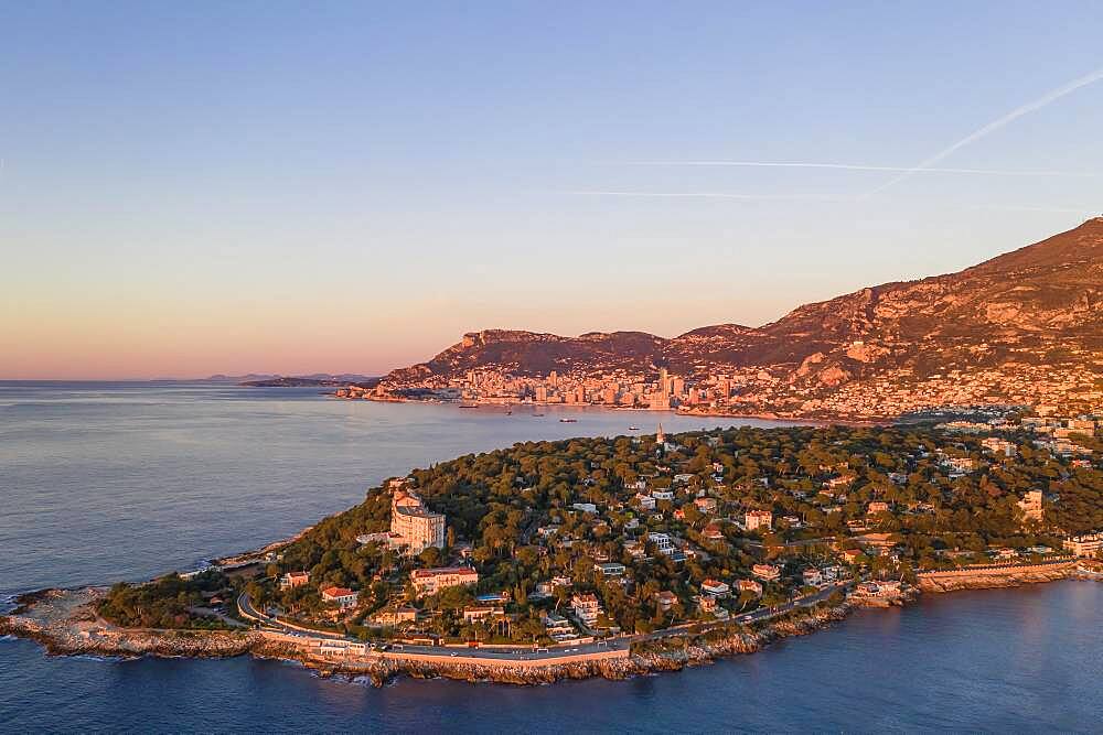 Aerial view Roquebrune Cap Martin shortly after sunrise, Cap Martin with former Grand Hotel du Cap Martin, in the back Principality of Monaco, Departement Alpes-Maritimes, Region Provence-Alpes-Cote d'Azur, France, Europe