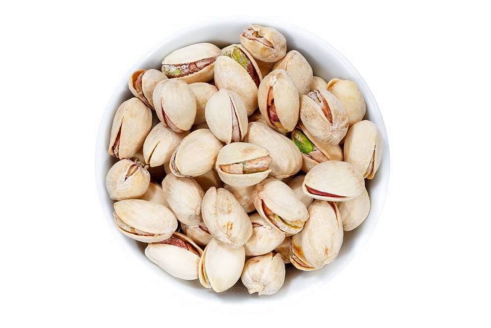 Pistachios pistachio nuts from above crop on a white background