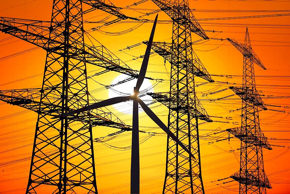 Overhead lines, wind turbine, sunset, Baden-Wuerttemberg, Germany, Europe