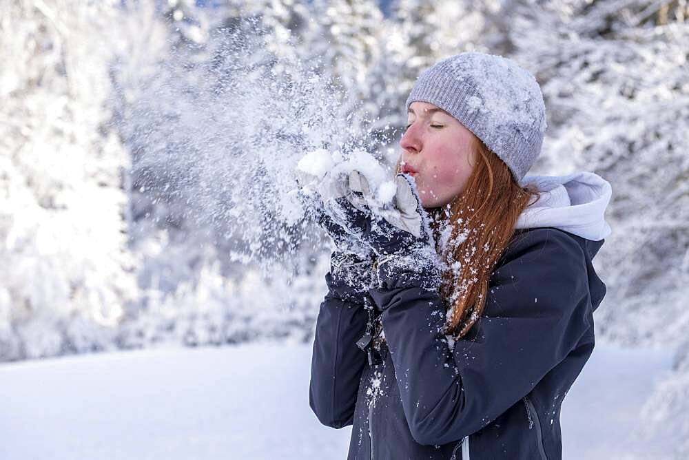 Woman enjoying the snow during winter walk, winter with snow, snowy landscape, Bad Heilbrunn, Upper Bavaria, Bavaria, Germany, Europe