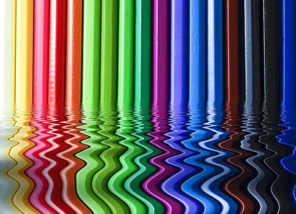 Crayons reflected in water