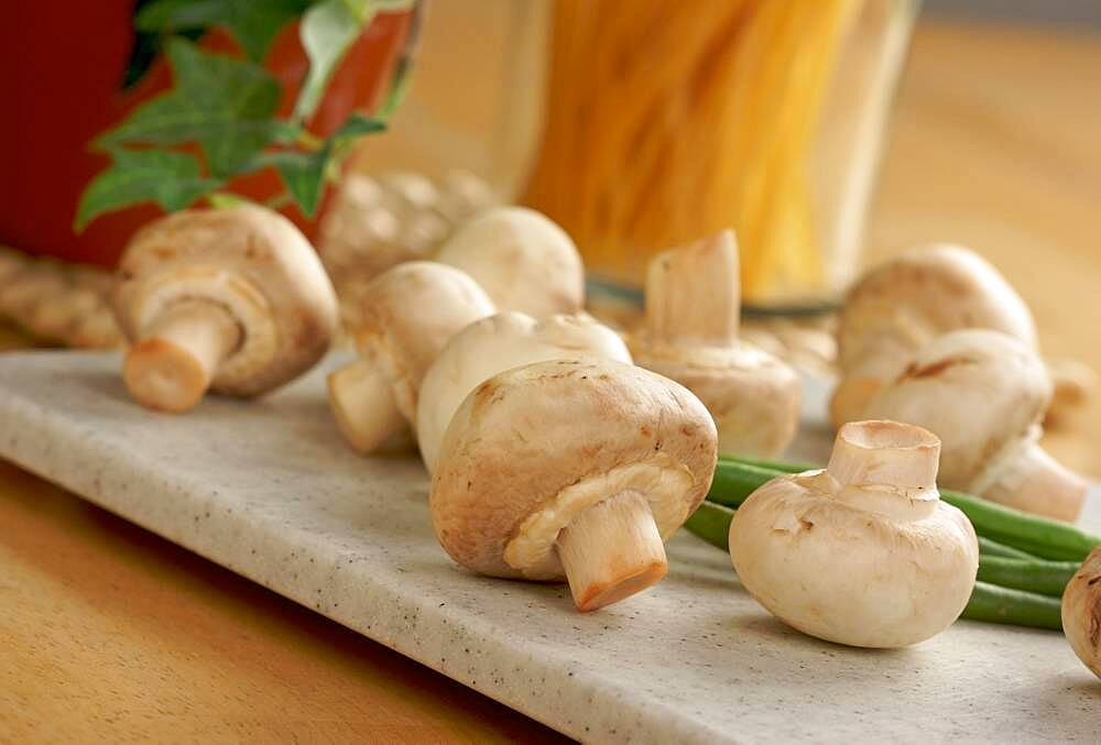 Fresh, healthy mushrooms on a cutting board