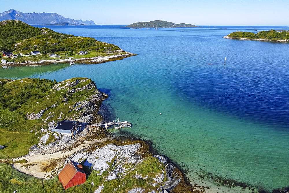 Aerial of a remote little bay and settlement along the road to the Nordkapp, Norway, Europe