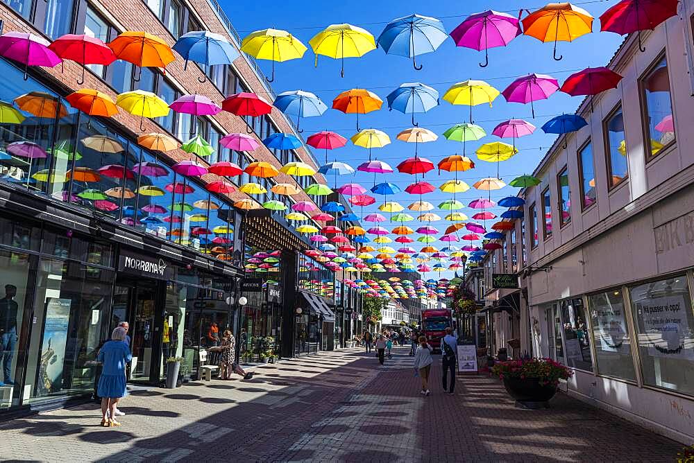 Open Umbrellas hanging over the pedestrian zone of Trondheim, Norway, Europe