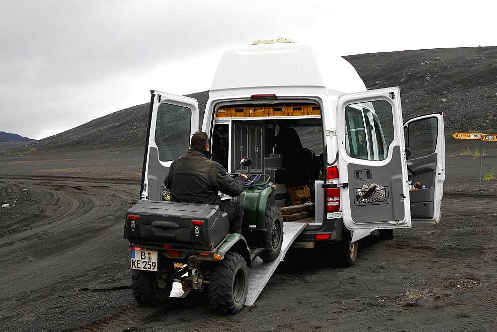 ATV is loaded into Sprinter, ATV rider, biker, quad, Yamaha Grizzly, Mercedes Sprinter camper, camper, ramps, lava desert Krepputunga, highland road Austurleio, Asturleid, F 910, highlands, central Iceland, Iceland, Europe