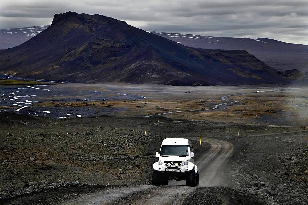 Highland track with Mercedes Sprinter highland bus, F 550, Kaldadalsvegur, black volcanic landscape, lava desert, Kaldidalur, highlands, Iceland, Europe