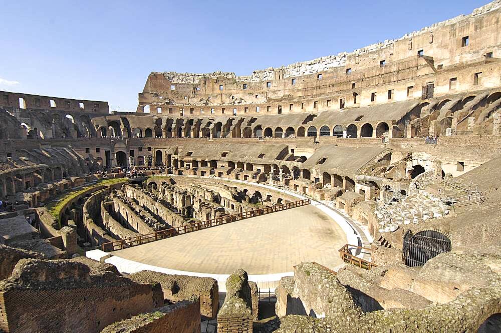 Grandstands and partially restored arena, stage in interior of Colosseum, Rome, Lazio, Italy, Europe